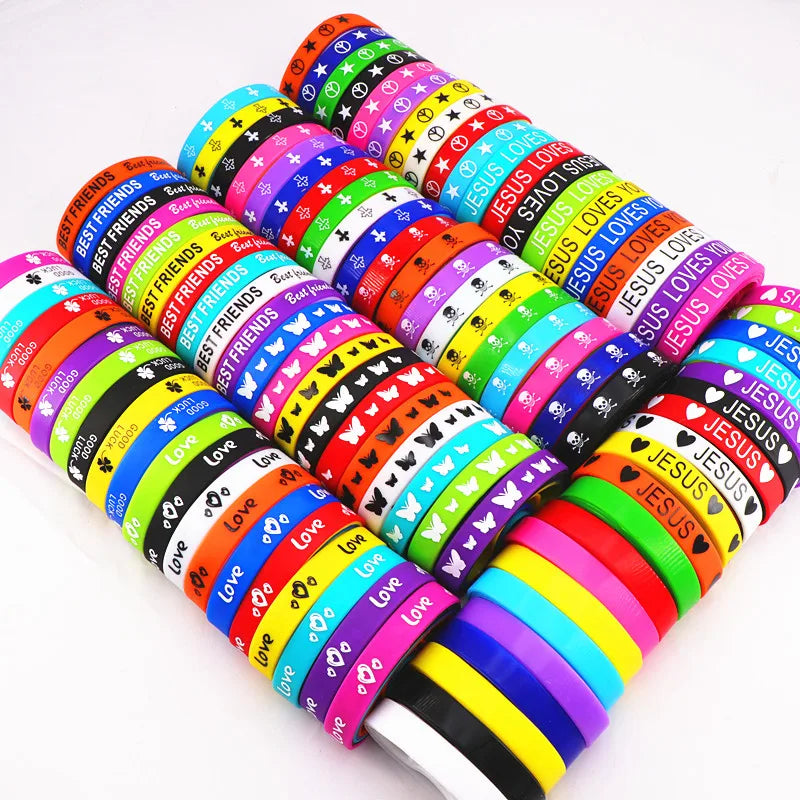 Pack of 100pcs Multicolor Elasticity Jesus Cross Skull Peace Butterfly Etc Style Wrist Cuff Silicone Bracelets For Man Women