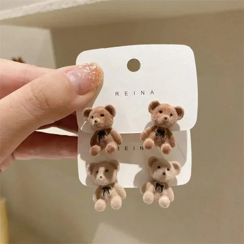 Pendientes de moda de Corea con agujas de plata para otoño e invierno, bonitos pendientes de orejas de conejo con flocado, pendientes de oso para mujeres y niñas