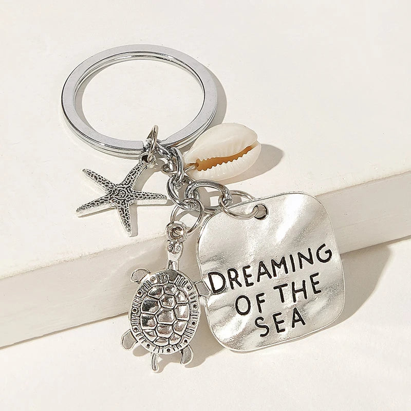 LLavero de estrella de mar de tortuga colgante soñando con el mar llavero de aleación bolsa accesorios de adorno