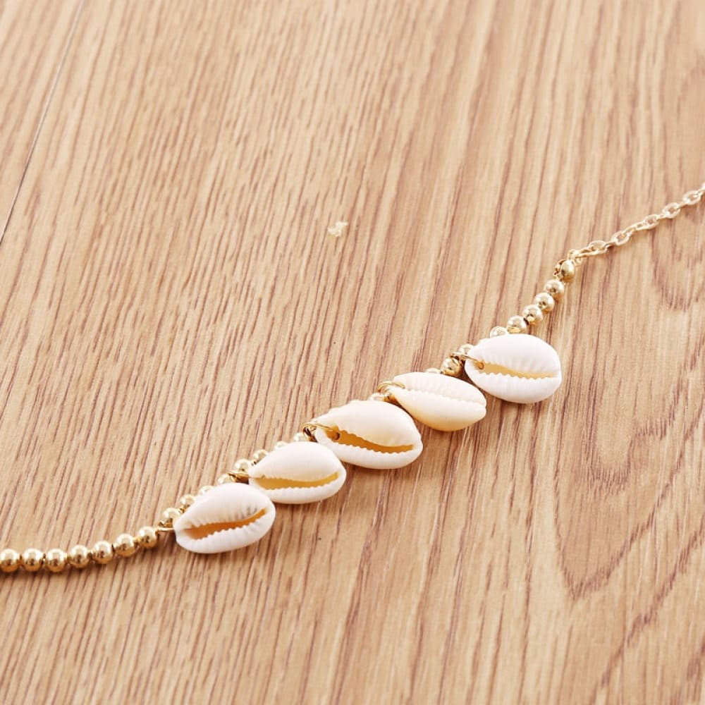 Gold Puka Shell Necklace